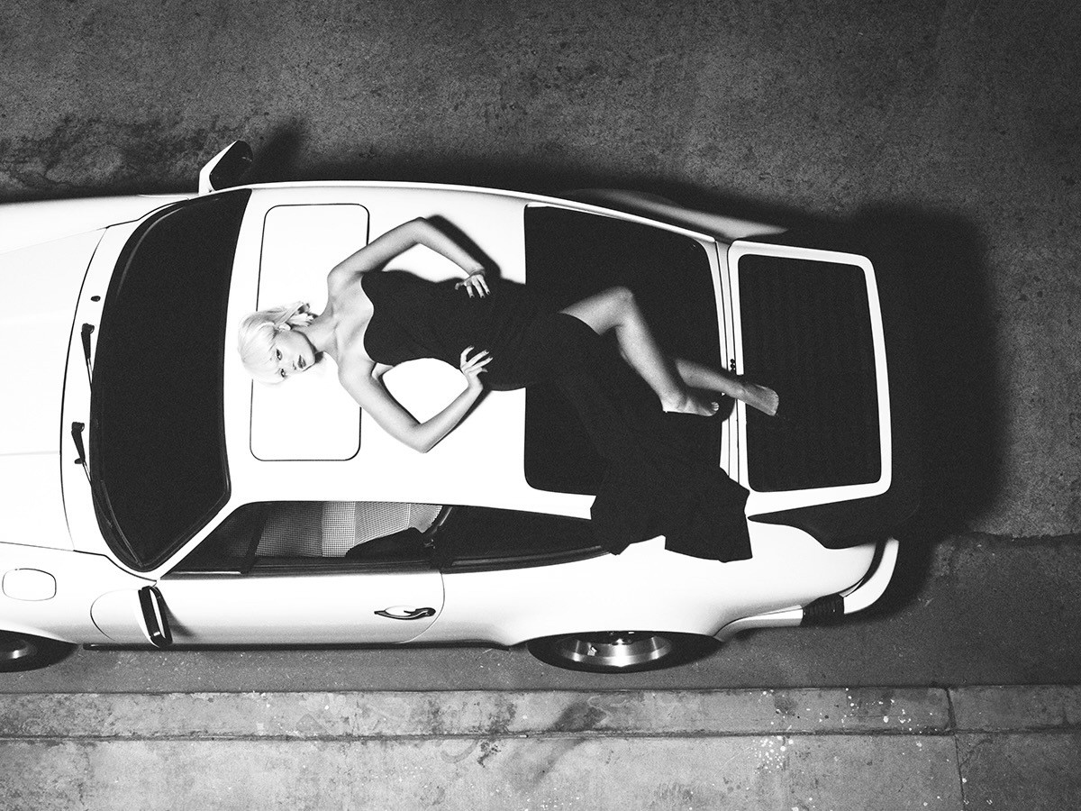 Tyler Shields - The Girl on the Car, 2024, Digital c print