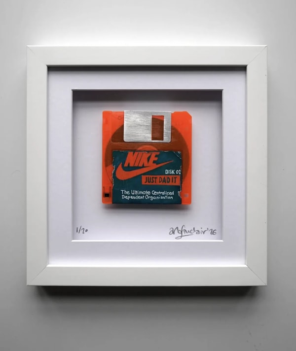 Arlo Sinclair - Nike: Just DAO It - 3.5” Fluorescent Orange, 2026, Hand-painted retro floppy disk: acrylic paint, plastic ...