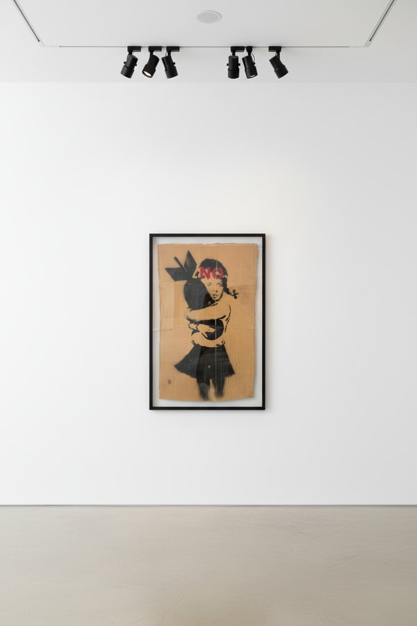 Banksy - Wrong War Cardboard (Bomb Hugger), 2003, Spray paint on cardboard