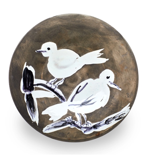 Pablo Picasso - Deux Oiseaux, 1963, White earthenware ceramic plate with colored engobe and glaze.- Marked and numbered 'E...