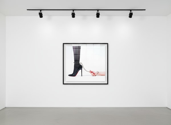 Tyler Shields - Hand Cuff High Heel, 2022, Digital c print